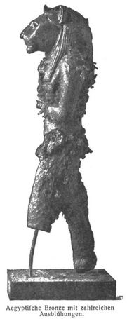 Aegyptische Bronze mit zahlreichen Ausblühungen.